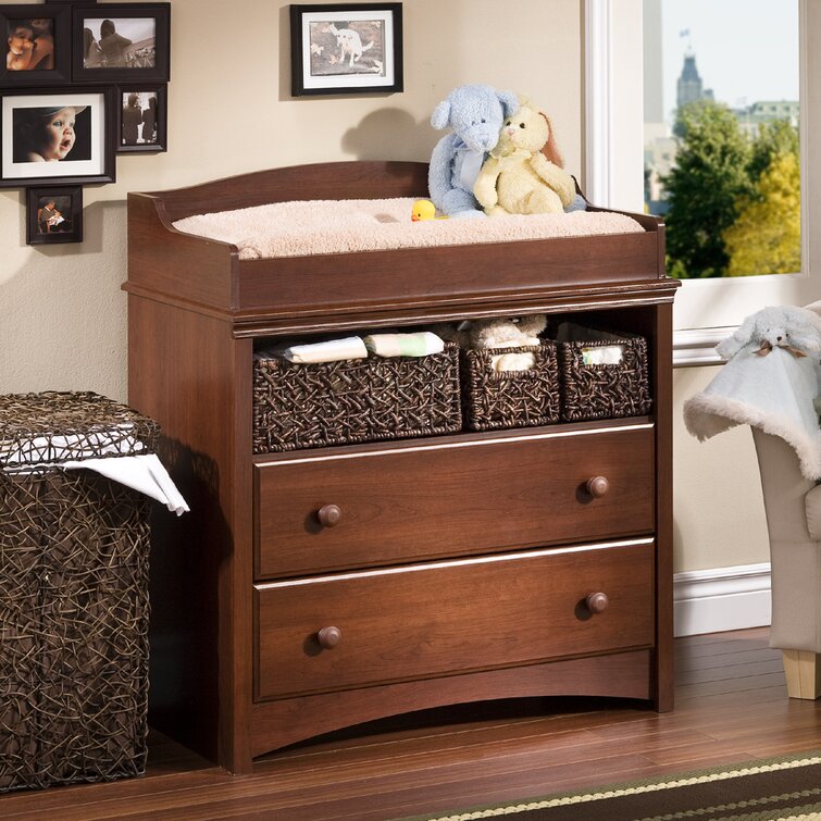 Brown changing table store dresser